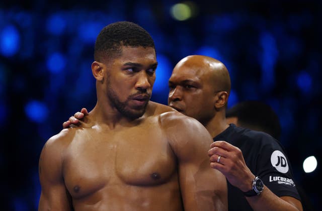 <p>Anthony Joshua with his new coach Derrick James</p>