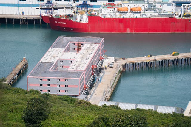 <p>The Bibby Stockholm barge at Portland, Dorset, will house up to 500 people (James Manning/PA)</p>