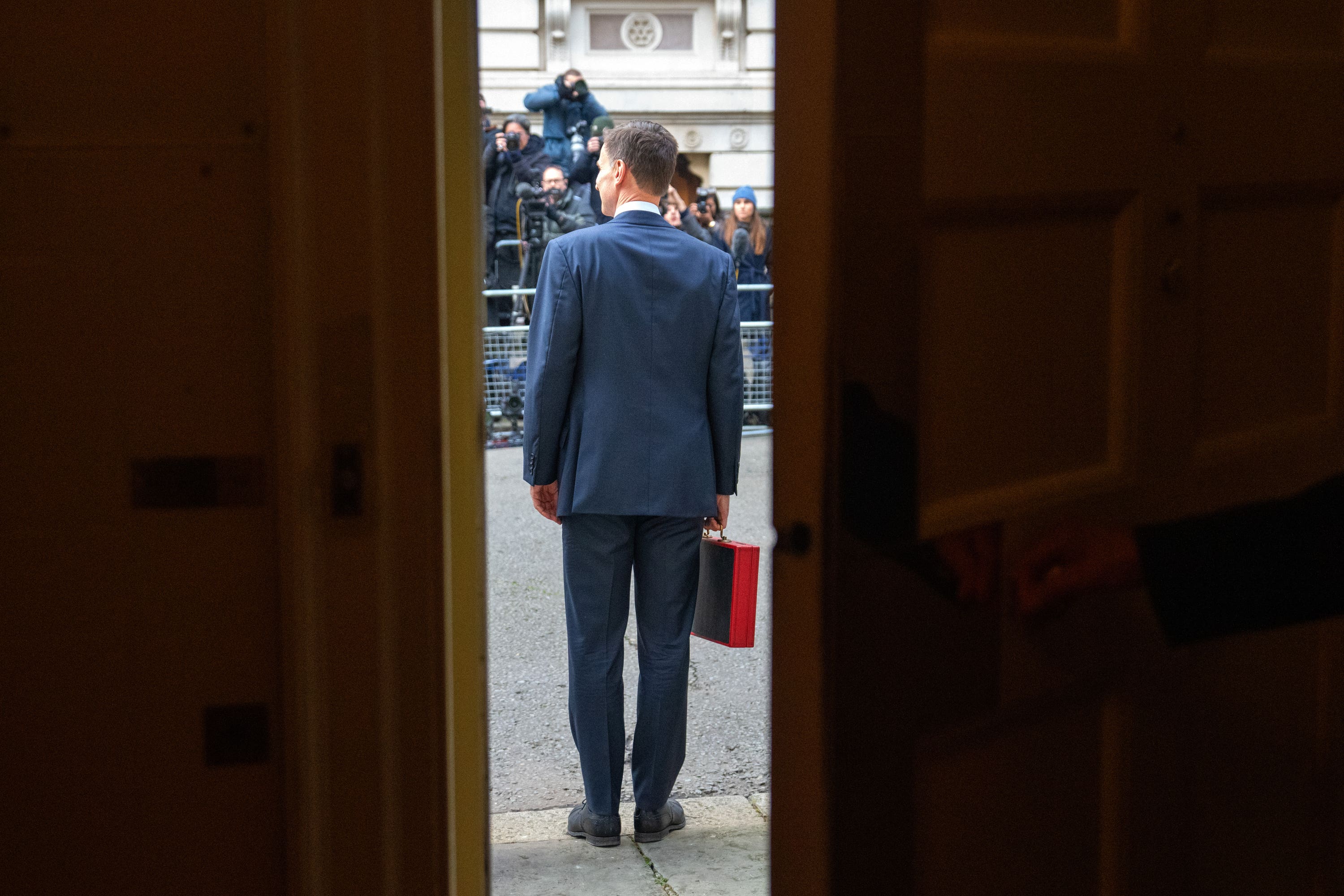 Jeremy Hunt announced cuts to national insurance in his Budget (Carl Court/PA)