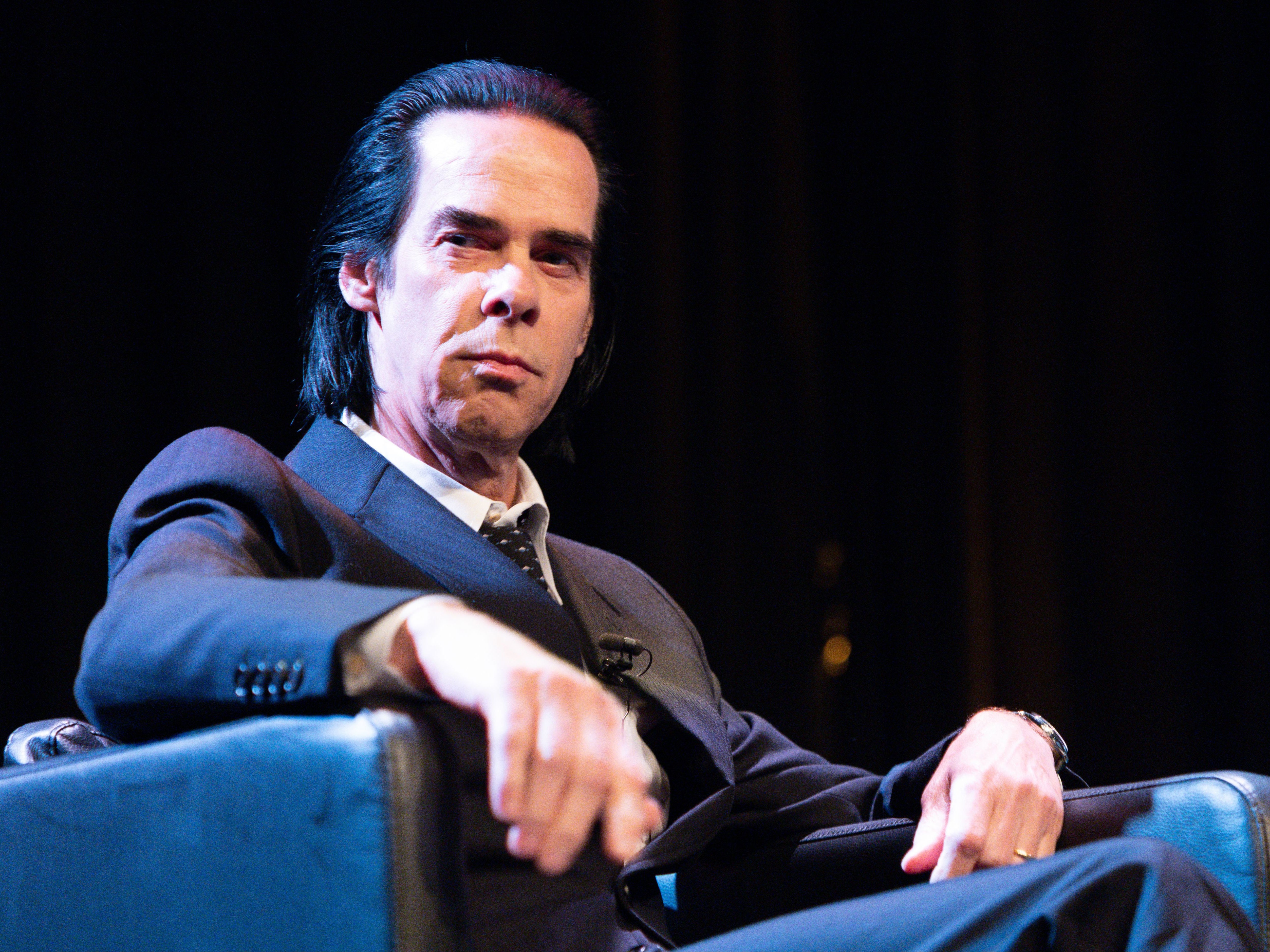 Nick Cave said he was forced to grieve in public after his son Arthur’s death