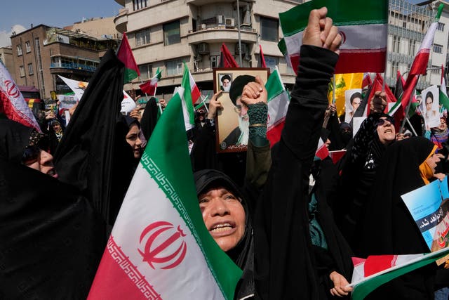 <p>Iranians protest in Tehran after Israel’s ‘limited’ attack on a strategically important military air base in Isfahan</p>