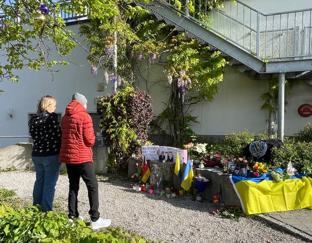 <p>Residents mourn the death of two Ukrainian soldiers in the small southern town of Murnau, Germany</p>