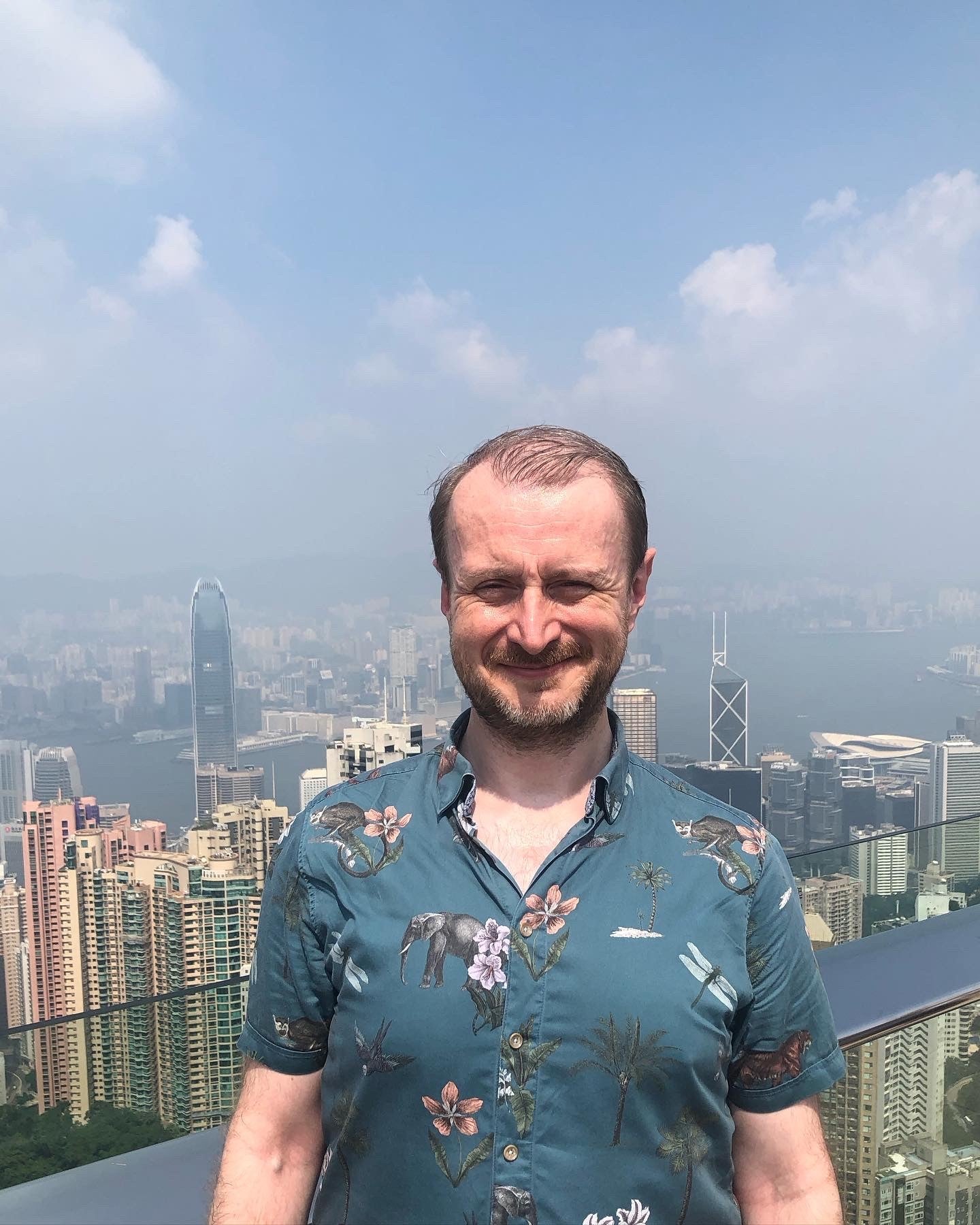 Damon Smith squints in the bright sunshine at the top of Victoria Peak in Hong Kong