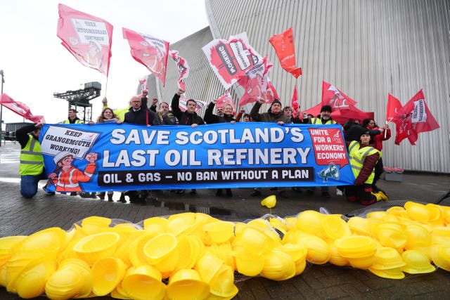 Protesters braved wet and windy weather to protest over Labour’s response to the closure of Grangemouth (Andrew Milligan/PA)