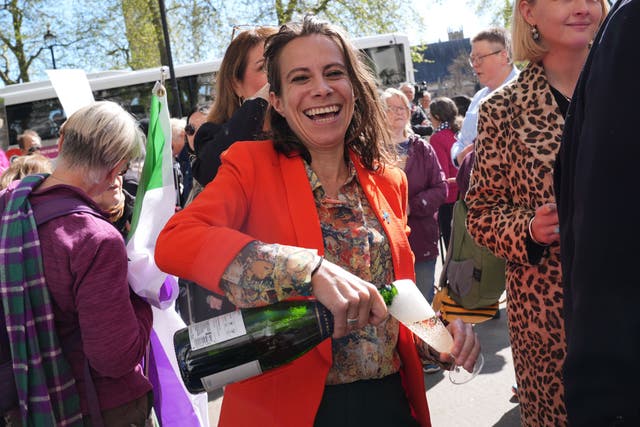 Campaigners celebrate outside the Supreme Court in London (Lucy North/PA)