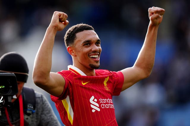 <p>Liverpool’s Trent Alexander-Arnold celebrates at the final whistle (Mike Egerton/PA)</p>