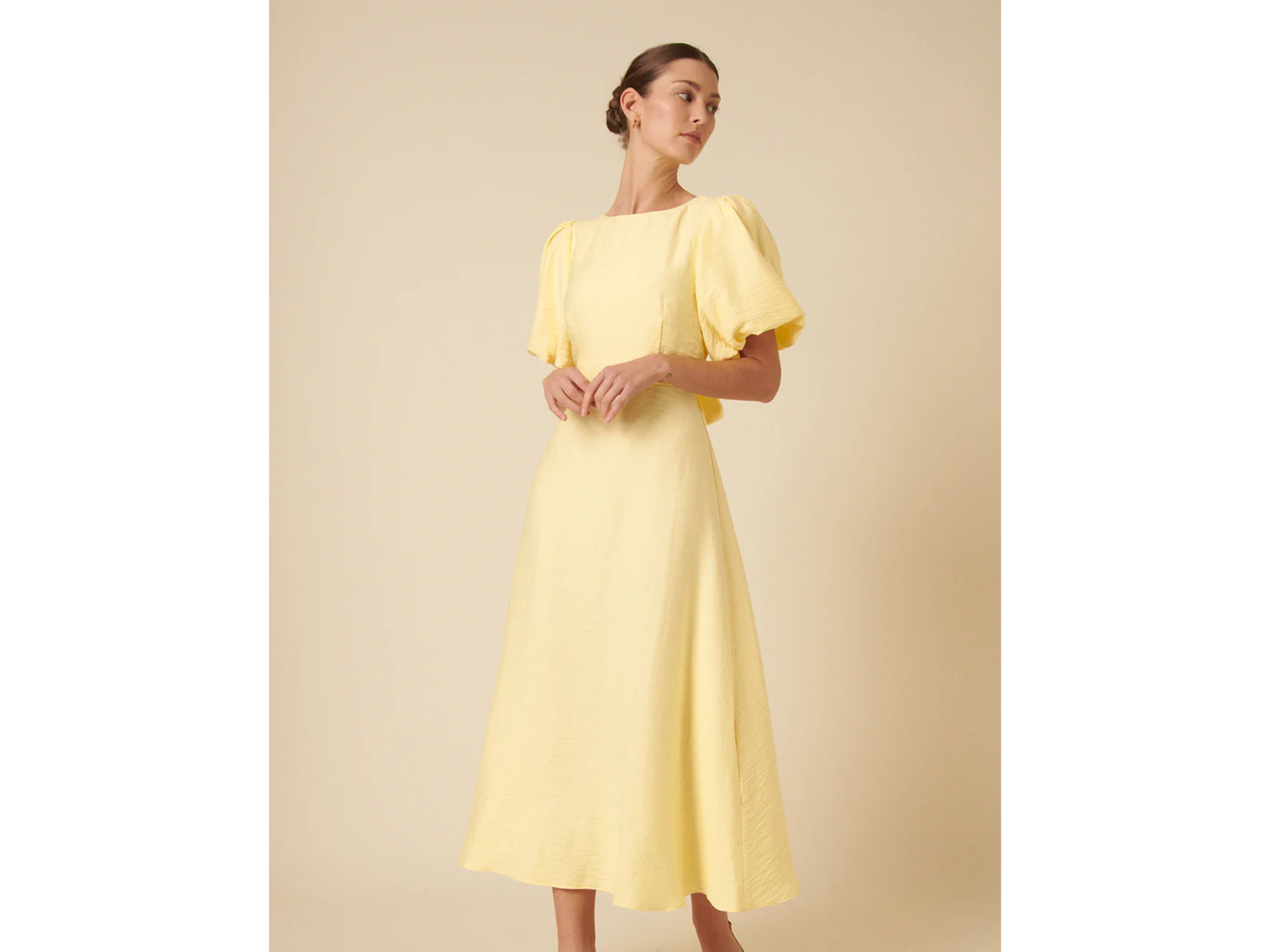 Midi dresses are the perfect way to segue into summer