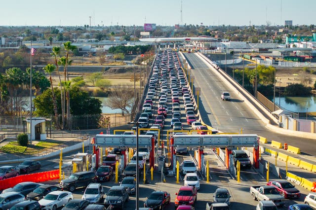 <p>In an aerial view, vehicles sit in traffic while waiting to cross the U.S.-Mexico border on February 3, 2025, in Laredo, Texas</p>