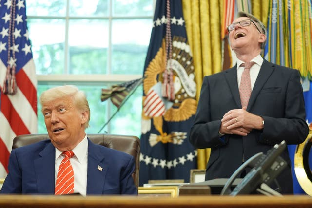<p>US President Donald Trump gets a reaction from UK ambassador to the United States Peter Mandelson as they take questions from the media in the Oval Office</p>
