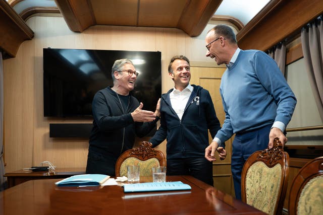 <p>Britain's Prime Minister Keir Starmer, left, meets with French President Emanuel Macron, center, and German Chancellor Friedrich Merz onboard a train to the Ukrainian capital Kyiv where all three will hold meetings with Ukrainian President Volodymyr Zelenskyy</p>