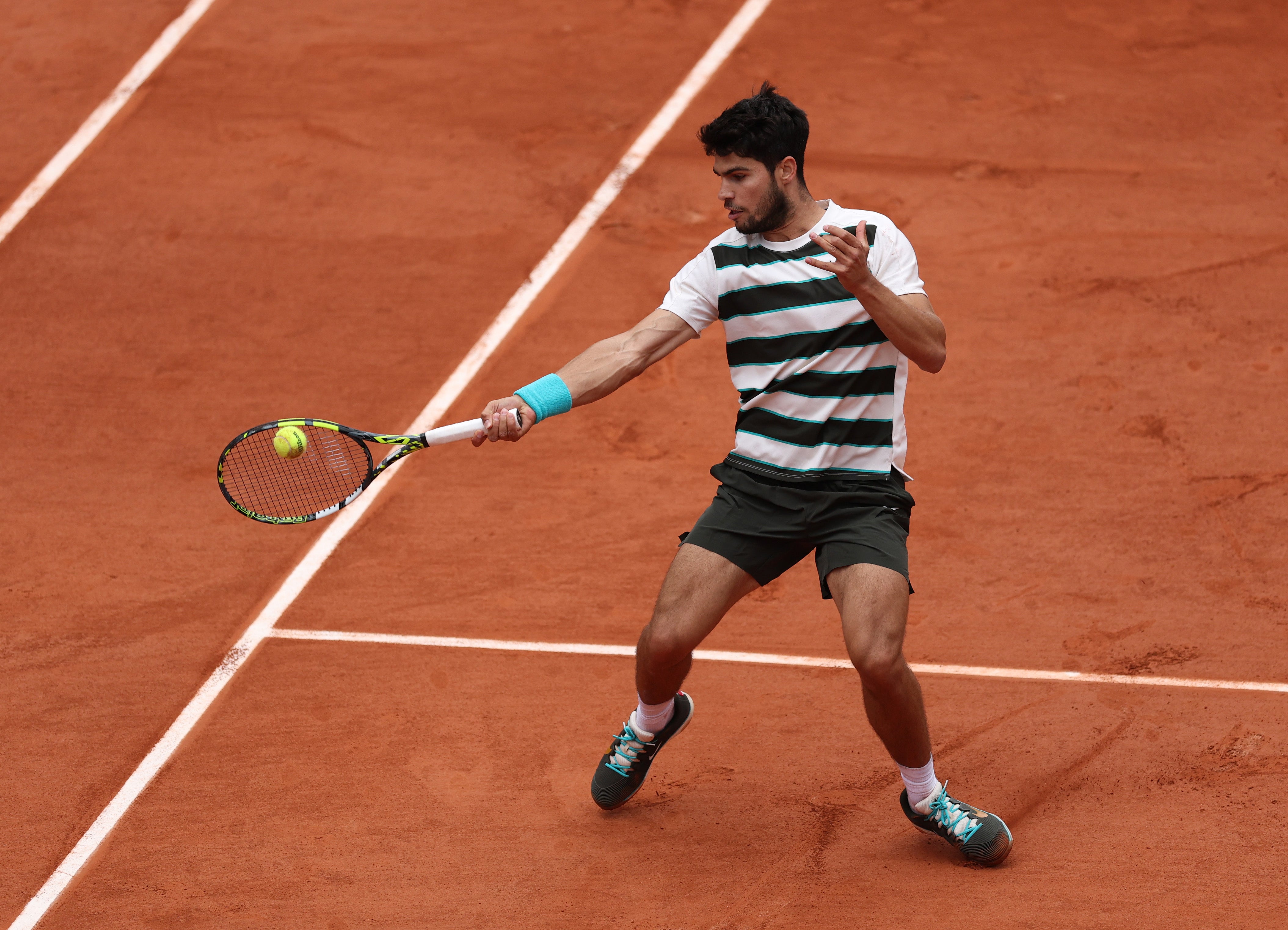 Carlos Alcaraz also sailed into the second with a straight set victory over Italy's Giulio Zeppieri