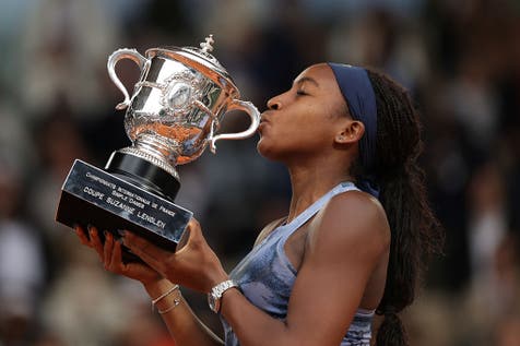 <p>Gauff kisses the Coupe Suzanne Lenglen, her second grand slam singles title</p>