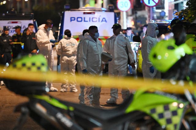 <p>Forensic experts work at the crime scene where Senator Miguel Uribe Turbay was shot and wounded in Bogota</p>