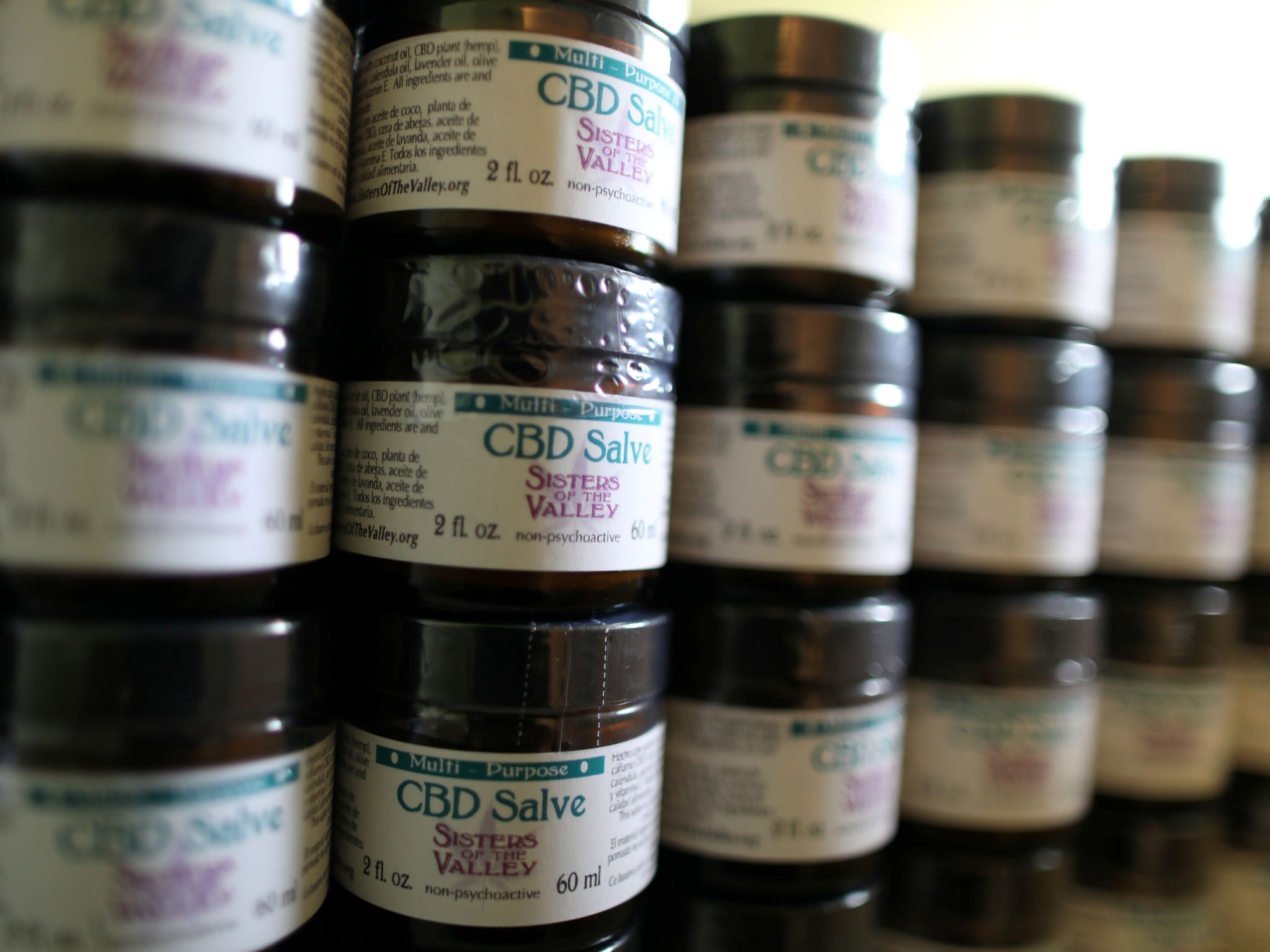 A CBD salve inventory made from hemp is seen stacked in a cupboard near Merced, California, U.S., April 18, 2017.
